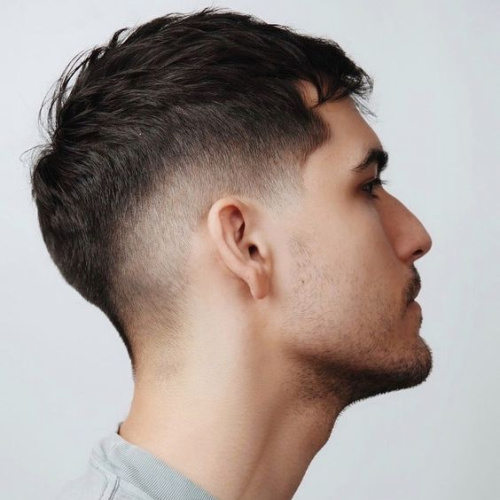 man with french crop and fade