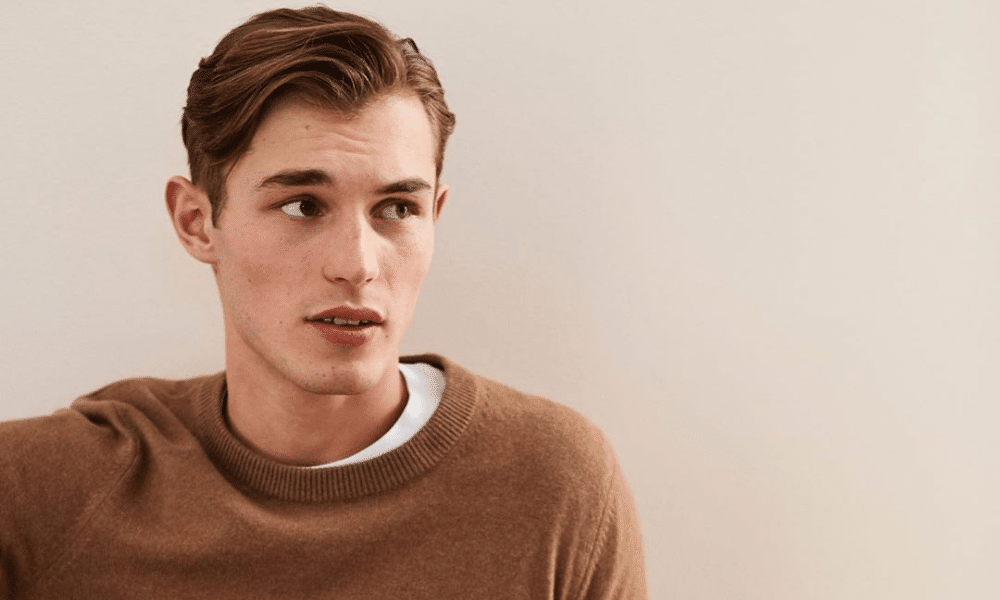 male model in brown knitwear