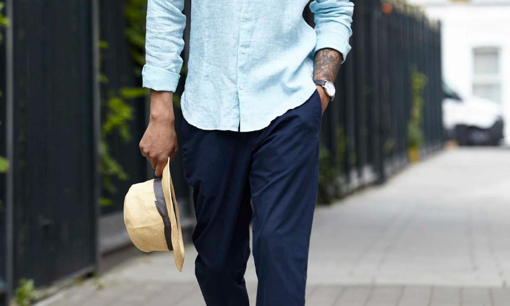 model wearing linen shirt and chinos